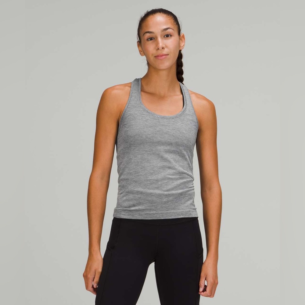 BNWOT Lululemon Swiftly Speed Racerback
White / White / Black Stripe. 
Size 4.